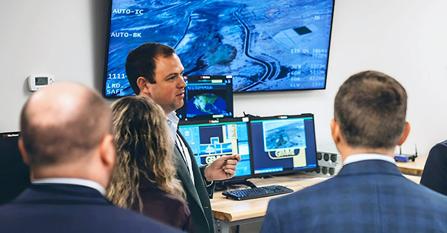 Parry Labs CEO, John Parkes, demonstrating edge computing and ground control station solutions in the company's Huntsville office lab.